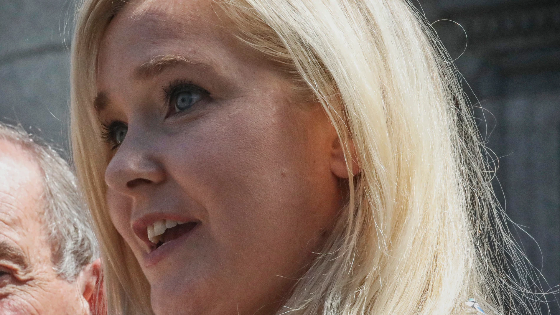 FILE - Virginia Giuffre holds a news conference outside a Manhattan court in New York, Aug. 27, 2019. (AP Photo/Bebeto Matthews, File)