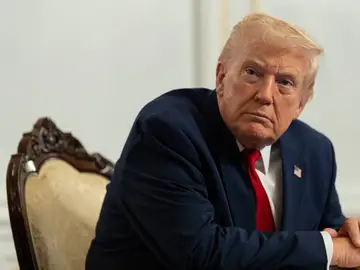 Trump President Donald Trump speaks to reporters after speaking to troops via video from his Mar-a-Lago estate on Thanksgiving, Thursday, Nov. 27, 2025, in Palm Beach, Fla. (AP Photo/Alex Brandon)
