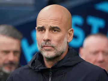Britain Premier League Soccer Manchester City's head coach Pep Guardiola waits for the start of the English Premier League soccer match between Manchester City and Leeds United in Manchester, England, Saturday, Nov. 29, 2025. (AP Photo/Ian Hodgson)