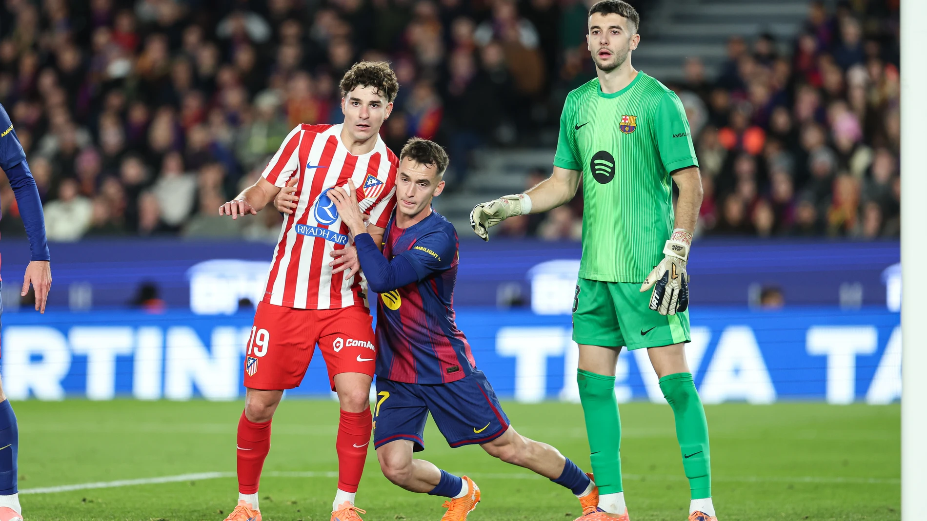 Julian Alvarez of Atletico de Madrid, and Marc Casado and Joan Garcia of FC Barcelona in action during the Spanish league, La Liga EA Sports, football match played between FC Barcelona and Atletico de Madrid at Spotify Camp Nou stadium on December 2, 2025 in Barcelona, Spain. AFP7 02/12/2025 ONLY FOR USE IN SPAIN