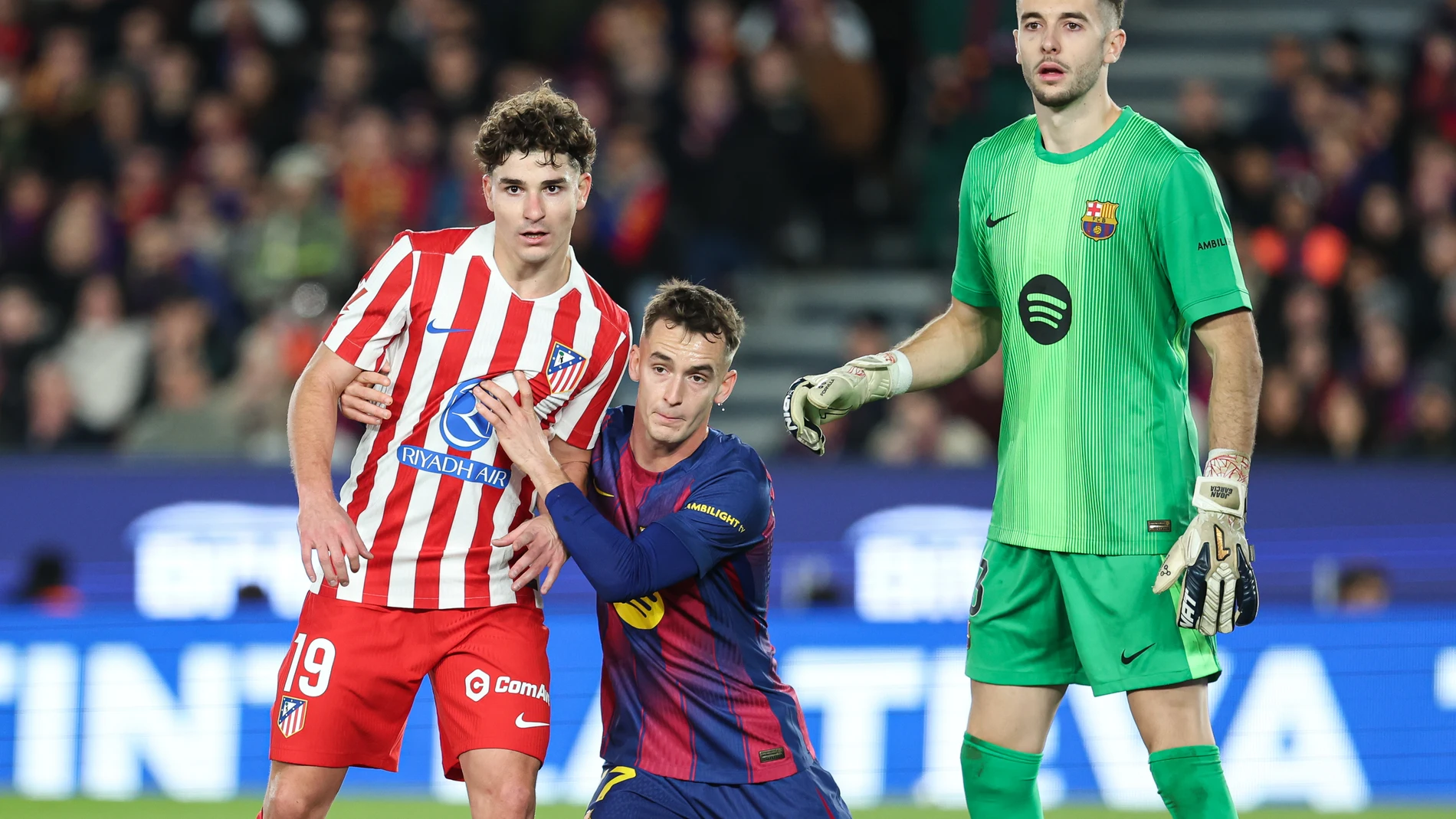 Julian Alvarez of Atletico de Madrid, and Marc Casado and Joan Garcia of FC Barcelona in action during the Spanish league, La Liga EA Sports, football match played between FC Barcelona and Atletico de Madrid at Spotify Camp Nou stadium on December 2, 2025 in Barcelona, Spain. AFP7 02/12/2025 ONLY FOR USE IN SPAIN