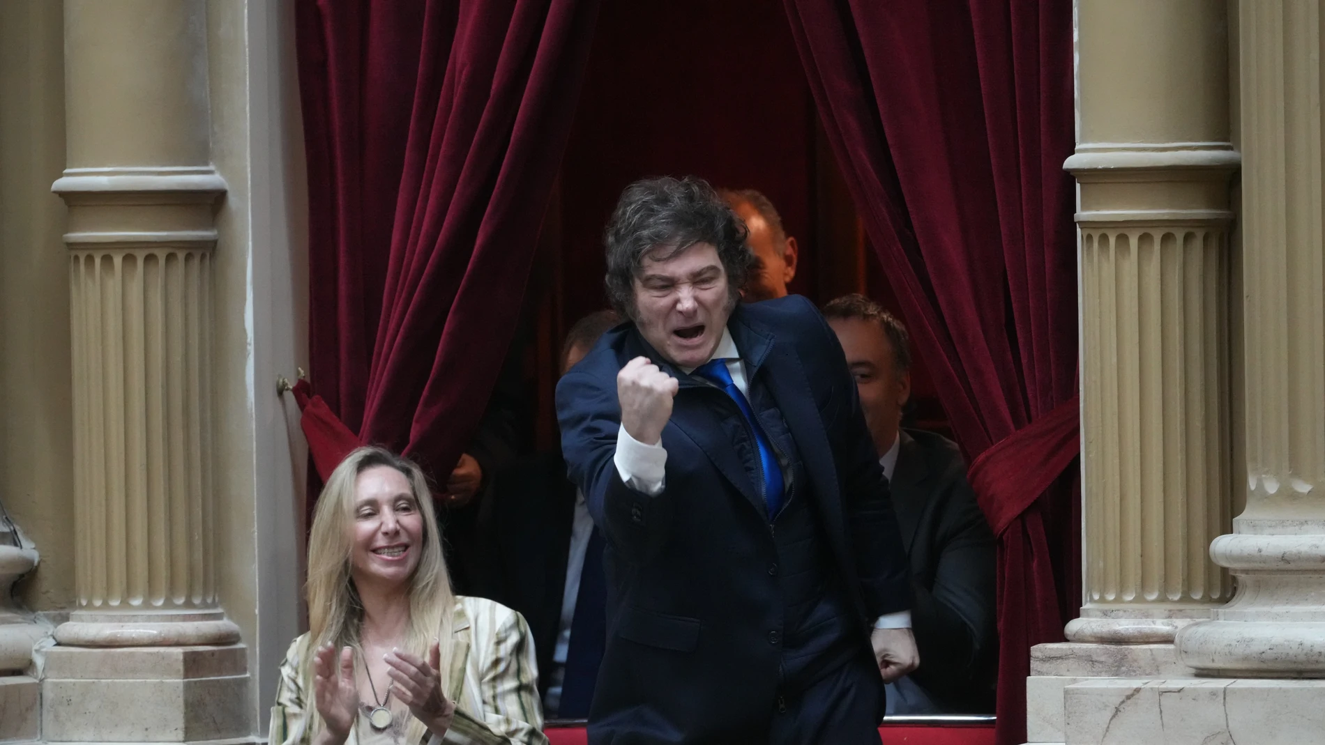 Argentine President Javier Milei, right, accompanied by General Secretary of the Presidency Karina Milei, his sister, during the swearing-in of newly elected legislators elected at Congress in Buenos Aires, Argentina, Wednesday, Dec. 3, 2025. (AP Photo/Rodrigo Abd)