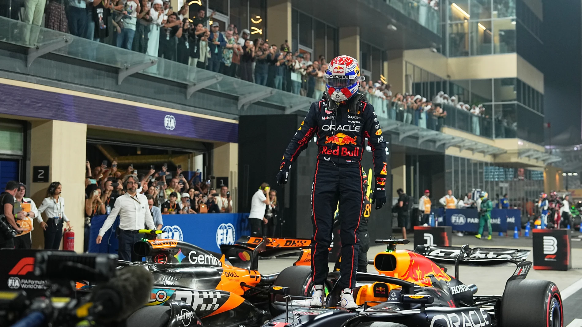 Red Bull driver Max Verstappen of the Netherlands celebrates after clocked the fastest time during the qualifying session ahead of the Formula One Abu Dhabi Grand Prix at the Yas Marina Circuit in Abu Dhabi, UAE, Saturday, Dec. 6, 2025. (AP Photo/Fatima Shbair)