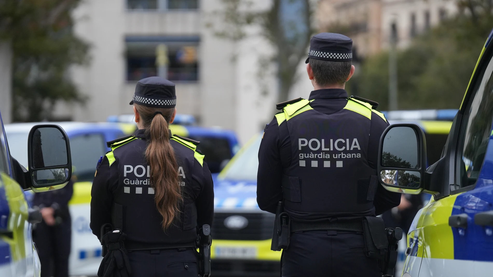 Agentes de la Guardia Urbana durante la presentación de los nuevos vehículos del cuerpo policial