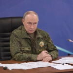 Russian President Vladimir Putin visits one of the command posts of Russian Army