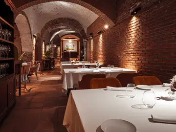 Uno de los salones del restaurante Arrope Uno de los salones del restaurante Arrope