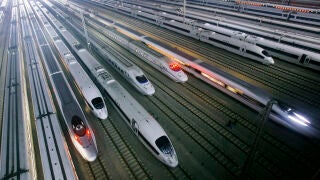 China's CRH high-speed trains sit on tracks at a maintenance base in Wuhan, in central China's Hubei province, Wednesday Jan. 11, 2012. 