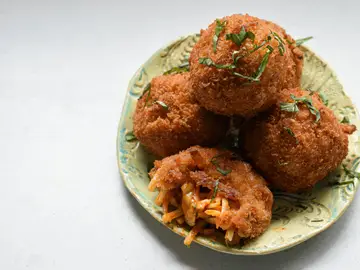 Foto de archivo de arancini italianos Foto de archivo de arancini italianos