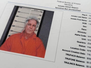 A document that was included in the U.S. Department of Justice release of the Jeffrey Epstein files, photographed Tuesday, Feb. 10, 2026, shows a photo of Epstein on a inmate report from the Federal Bureau of Prisons . (AP Photo/Jon Elswick)