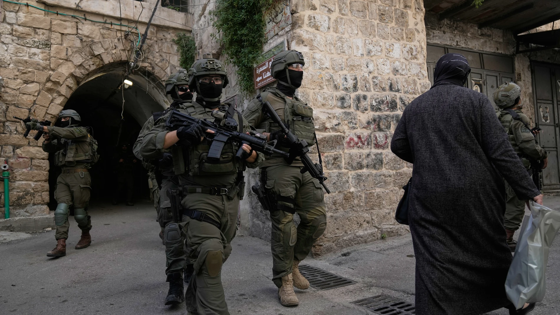 Israeli soldiers are seen during an army raid in the West Bank town of Nablus, Wednesday, Feb. 11, 2026. (AP Photo/Majdi Mohammed)