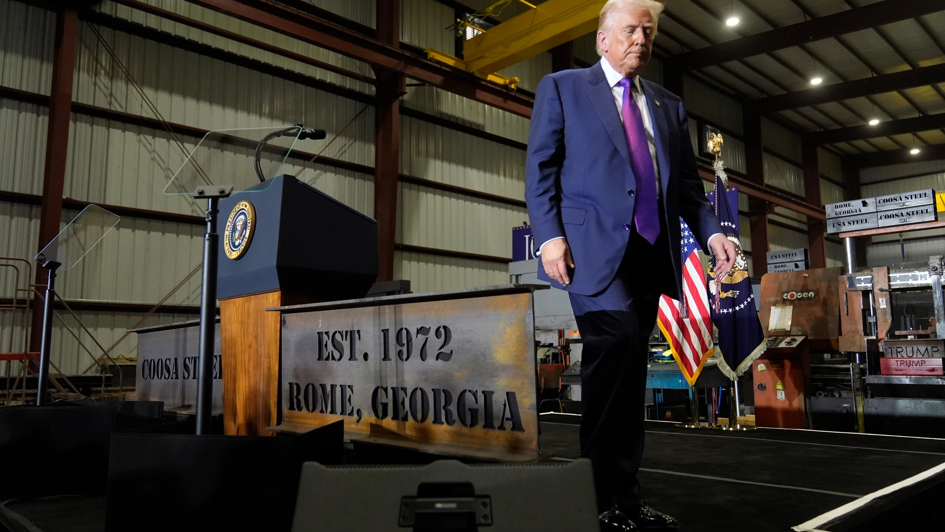 President Donald Trump gets ready to exit the stage after speaking at a rally at Coosa Steel Corporation in Rome, Ga., Thursday, Feb. 19, 2026. (AP Photo/Mark Schiefelbein)