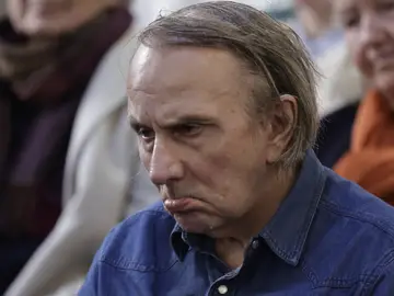 French writer Michel Houellebecq looks on as he attends a meeting on euthanasia organised by the association "Les Eligibles et leurs Aidants" as French National Assembly debate French writer Michel Houellebecq looks on as he attends a meeting on euthanasia organised by the association "Les Eligibles et leurs Aidants" as French National Assembly debate