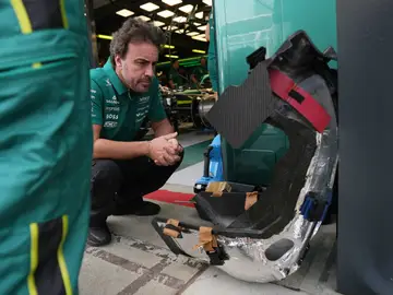 Australia F1 GP Auto Racing Aston Martin driver Fernando Alonso of Spain waits outside his team garage during the first practice session for the Australian Formula One Grand Prix at Albert Park, in Melbourne, Australia, Friday, March 6, 2026. (AP Photo/Asanka Brendon Ratnayake)
