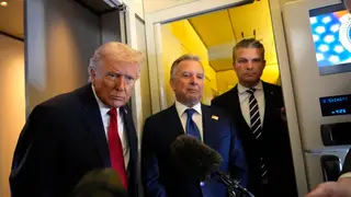 Trump From left, President Donald Trump, White House Special Envoy to the Middle East Steve Witkoff, center, and Defense Secretary Pete Hegseth listen to a reporter's question while traveling aboard Air Force One en route from Dover Air Force Base, Del., to Miami, Saturday, March 7, 2026. (AP Photo/Mark Schiefelbein)
