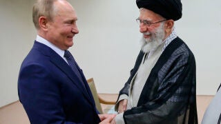 FILE - In this picture released by the official website of Iranian Supreme Leader Ayatollah Ali Khamenei, he and Russian President Vladimir Putin greet each other on July 19, 2022, during a meeting in Tehran, Iran. (Office of the Iranian Supreme Leader via AP, File)
