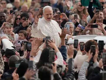 Vatican Pope Pope Leo XIV waves as he arrives for his weekly general audience in St. Peter's Square at The Vatican, Wednesday, March 11, 2026. (AP Photo/Gregorio Borgia)