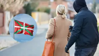 Imagen de archivo de un delito y de una bandera del País Vasco Imagen de archivo de un delito y de una bandera del País Vasco