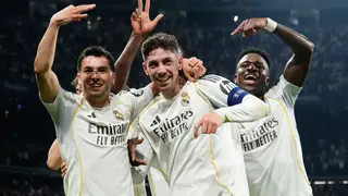 Spain Champions League Soccer Real Madrid's Federico Valverde, center, celebrates after scoring his third goal during a first leg round of 16 Champions League soccer match between Real Madrid and Manchester City in Madrid, Spain, Wednesday, March 11, 2026. (AP Photo/Jose Breton)