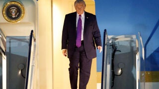 President Donald Trump walks down the stairs of Air Force One upon arrival at Joint Base Andrews, Md., Wednesday, March 11, 2026. (AP Photo/Luis M. Alvarez)