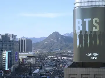 South Korea BTS A screen promoting a comeback concert of K-pop boy group BTS is seen near Gwanghwamun Square in Seoul, South Korea, Thursday, March 19, 2026. (AP Photo/Ahn Young-joon)