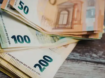 Imagen de archivo de bastantes billetes de dinero Imagen de archivo de bastantes billetes de dinero