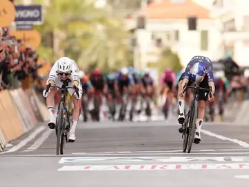 APTOPIX Italy Milan-Sanremo Cycling Slovenia's Tadej Pogacar of UAE Team Emirates XRG, left, crosses the finish line ahead of Britain's Thomas Pidcock of Pinarello-Q36.5 Pro Cycling Team, right, to win the men's elite race of the Milano-Sanremo one day cycling race (298 km) from Pavia to Sanremo, Italy, March 21, 2026. (Massimi Paolone/LaPresse via AP)
