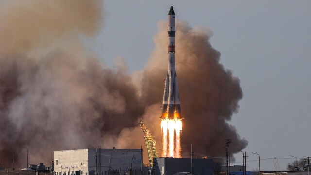 In this photo provided by Roscosmos space corporation, the Soyuz-2.1a rocket booster with Progress MS-33 cargo ship which will deliver cargo to the International Space Station lifts off from the launch pad at the Russian leased Baikonur cosmodrome, Kazakhstan, Sunday, March 22, 2026. (Roscosmos space corporation, via AP)