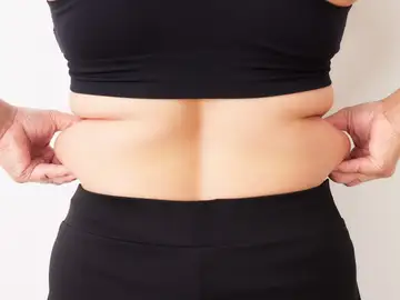 Imagen de archivo de una persona con sobrepeso Imagen de archivo de una persona con sobrepeso