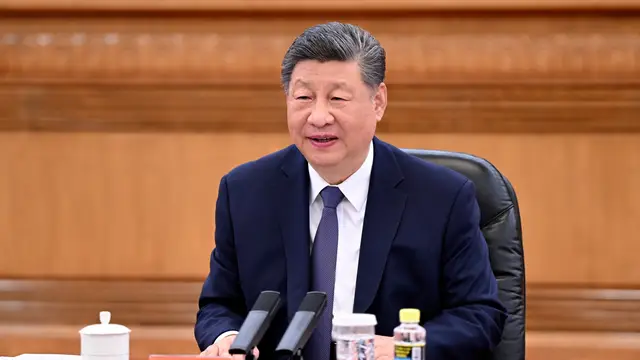 China Taiwan In this photo released by Xinhua News Agency, Chinese President Xi Jinping, speaks during a meeting with Kuomintang (KMT) party leader Cheng Li-wun, unseen at the Great Hall of the People in Beijing on Friday, April 10, 2026. (Xie Huanchi/Xinhua via AP)