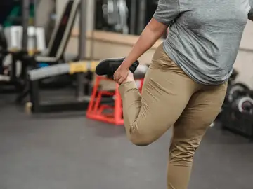 Imagen de archivo de una persona en el gimnasio Imagen de archivo de una persona en el gimnasio