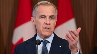 Prime Minister Mark Carney responds to a question following an announcement on Parliament Hill in Ottawa, Tuesday, April 14, 2026. (Adrian Wyld/The Canadian Press via AP)
