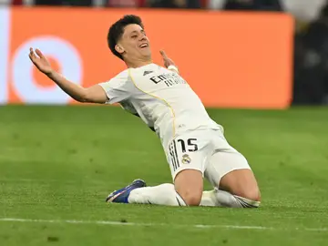 Germany Champions League Soccer Real Madrid's Arda Guler celebrates after scoring his side's second goal during the Champions League quarterfinal second leg soccer match between Bayern Munich and Real Madrid in Munich, Germany, Wednesday, April 15, 2026. (AP Photo/Lennart Preiss)