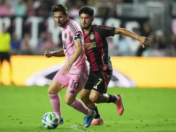Lionel Messi Lawsuit Soccer FILE - Inter Miami forward Lionel Messi (10) runs with the ball as Atlanta United midfielder Steven Alzate (7) defends during the first half of an MLS soccer match, Oct. 11, 2025, in Fort Lauderdale, Fla. (AP Photo/Lynne Sladky, File)