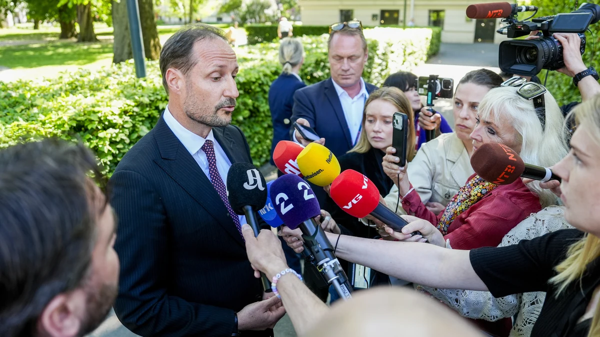 Norway's Crown Prince Haakon speaks to the media