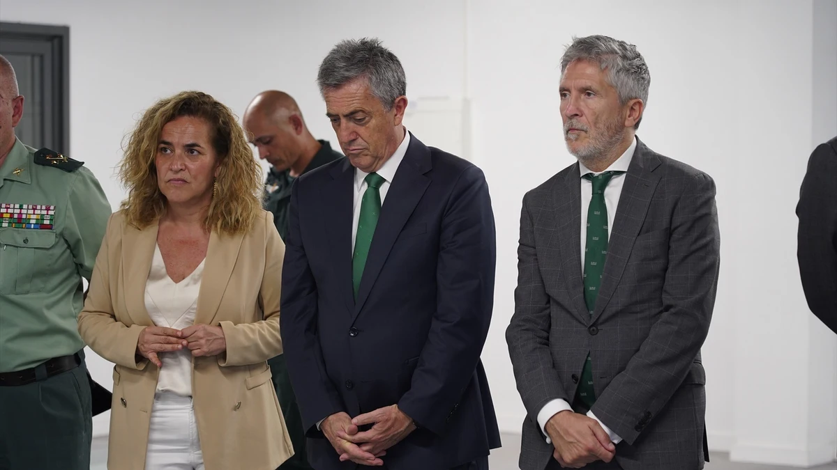 El exdirector general de la Guardia Civil, Leonardo Marcos, junto al ministro del Interior, Fernando Grande-Marlaska