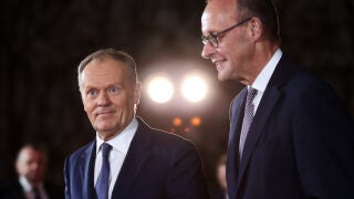 FILE - German Chancellor Friedrich Merz welcomes Polish Prime Minister Donald Tusk at the Chancellery in Berlin on Dec. 15, 2025. (AP Photo/Maryam Majd, File)